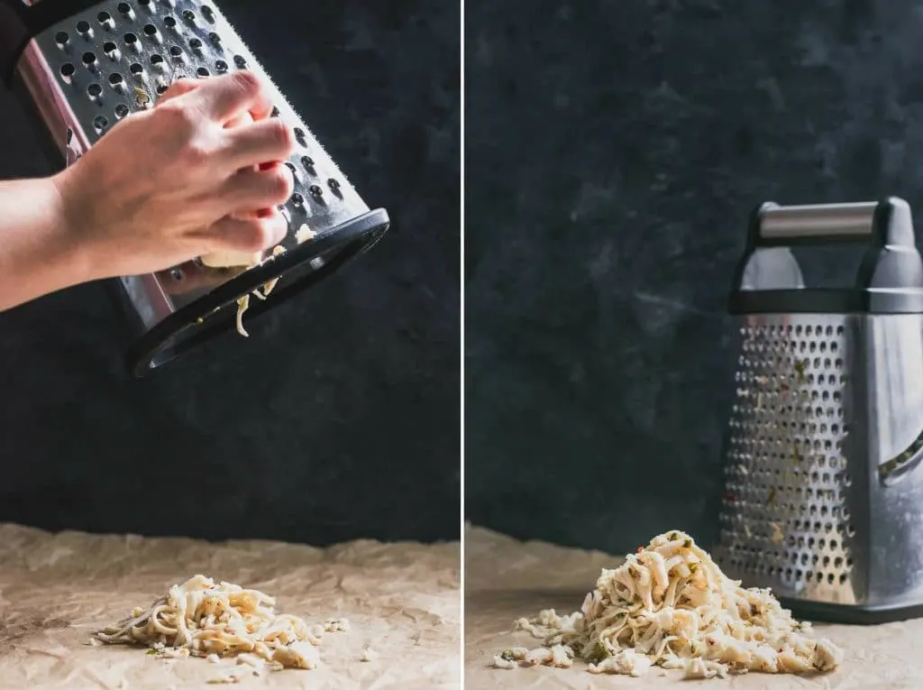 grating vegan roasted jalapeño cheese into shreds