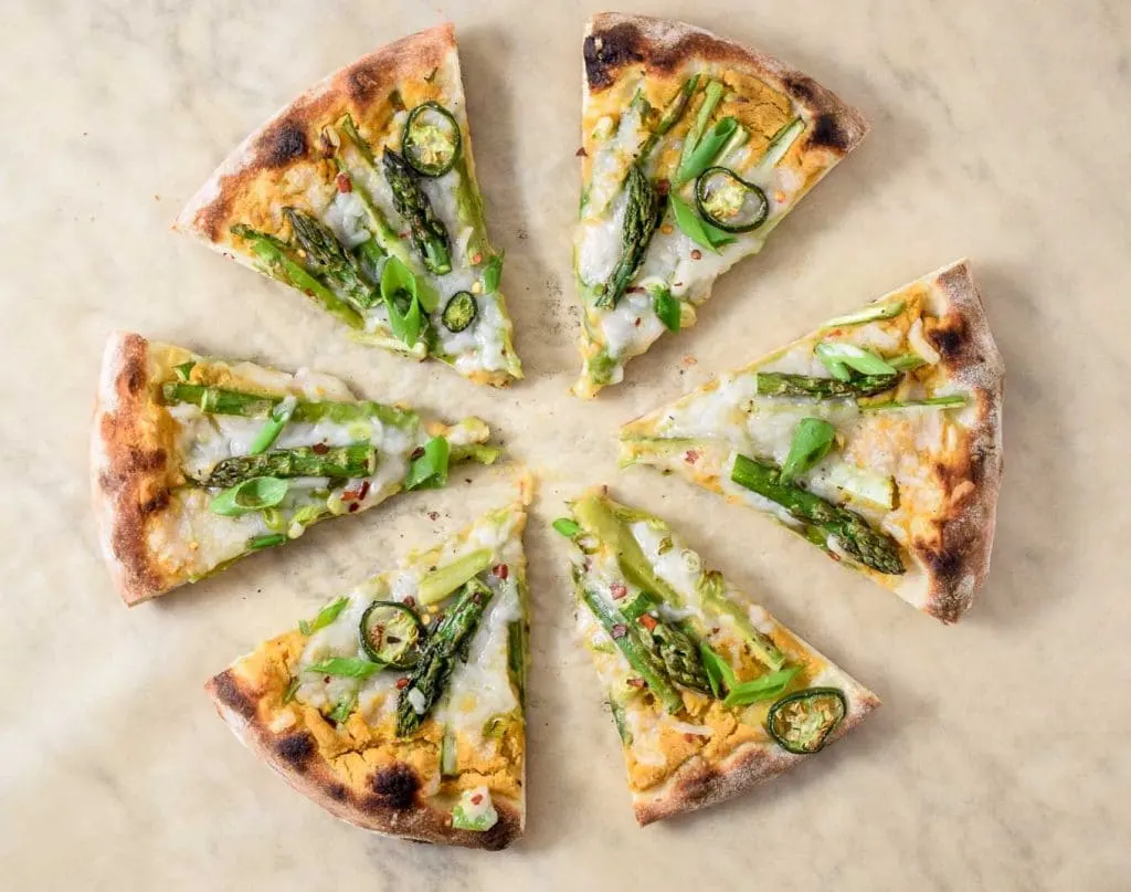 vegan asparagus pizza spicy chickpea sauce