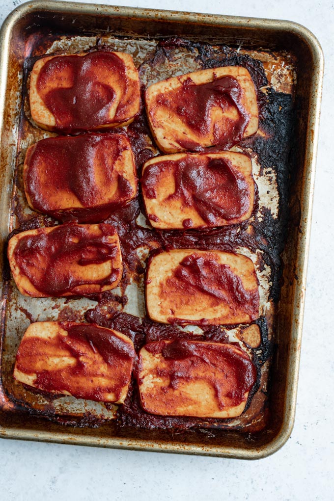 chipotle barbecue baked tofu on a baking tray just out of the oven