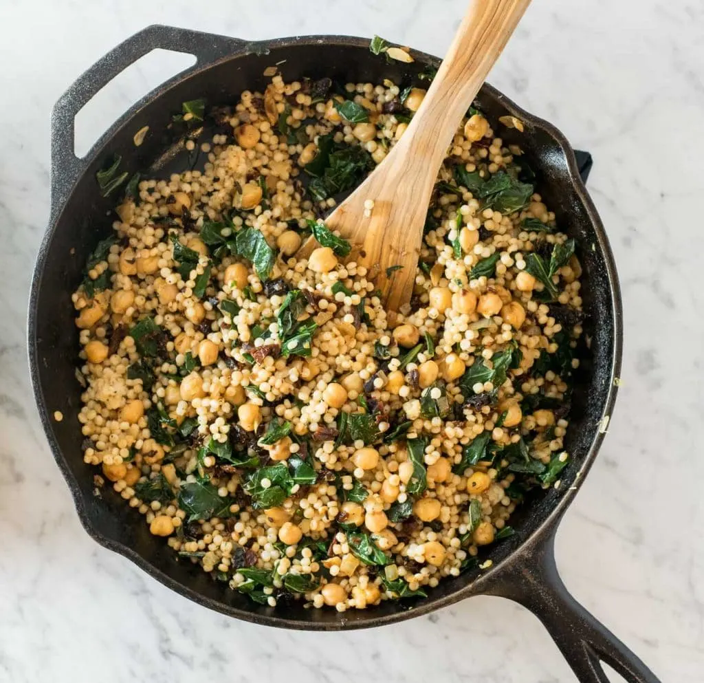 chickpeas, sundried tomatoes, collard greens, and couscous