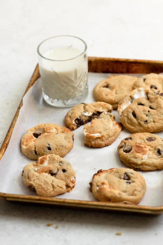 vegan chocolate chip marshmallow cookies with a glass of milk