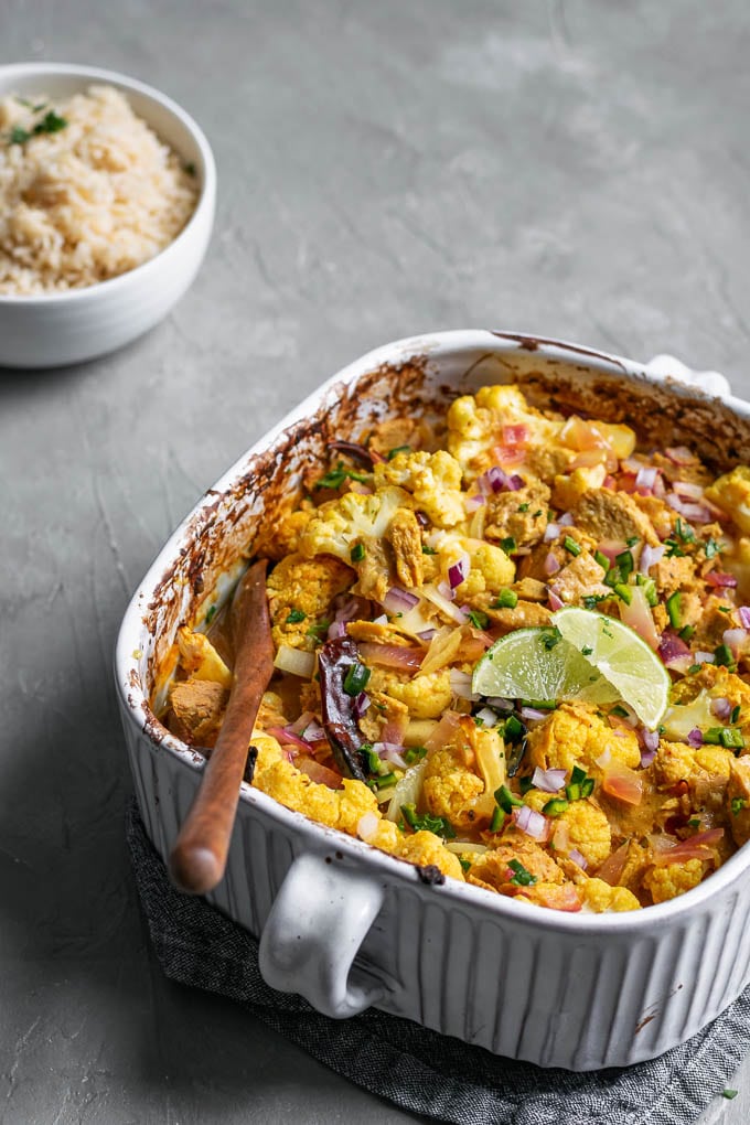 tandoori cauliflower and seitan baked in a casserole dish and served