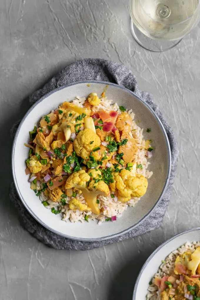 tandoori cauliflower and seitan with a glass of wine