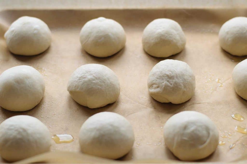 vegan homemade pretzel dough shaped into buns