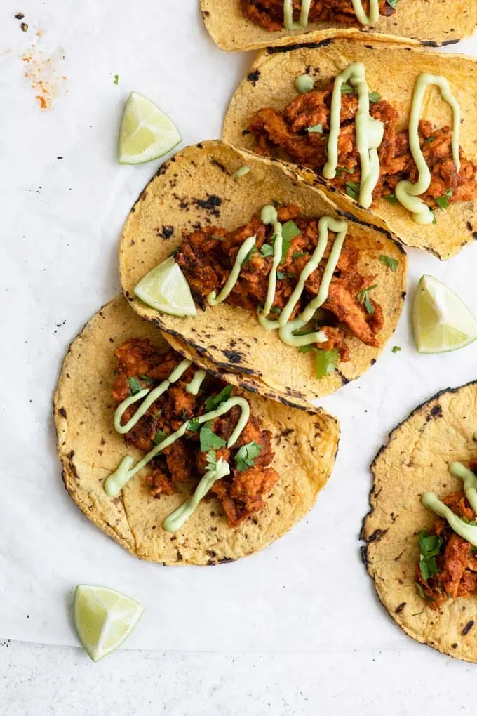 vegan tinga tacos with avocado crema