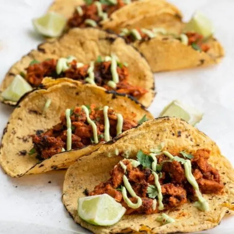 vegan tinga tacos with avocado crema
