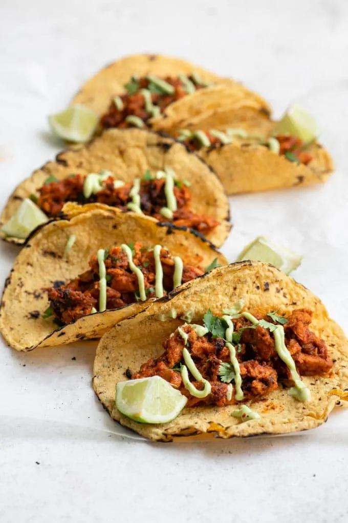 vegan tinga tacos with avocado crema