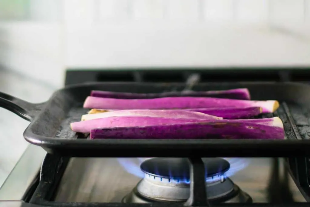 eggplant grilling on gas stove