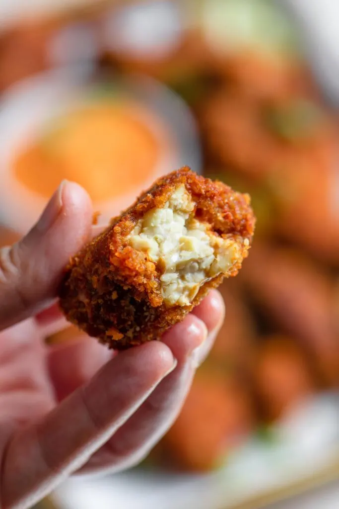 close up of bite shot showing texture of tempeh wing