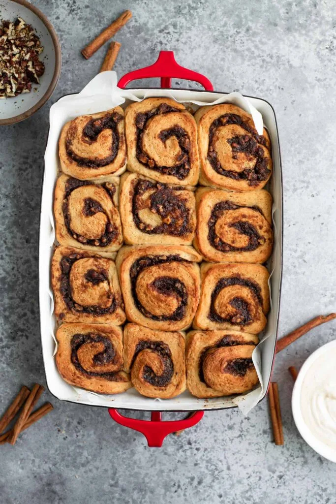 baked unfrosted cinnamon rolls in baking dish