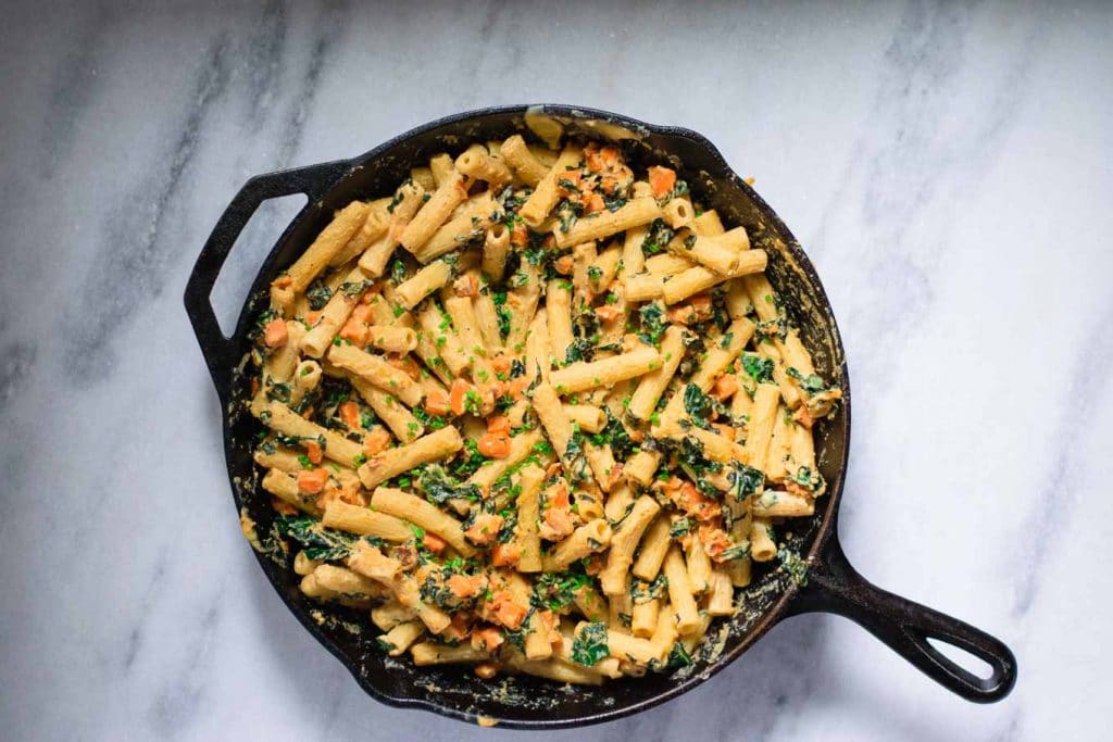 vegan tahini pasta skillet with sweet potato and kale