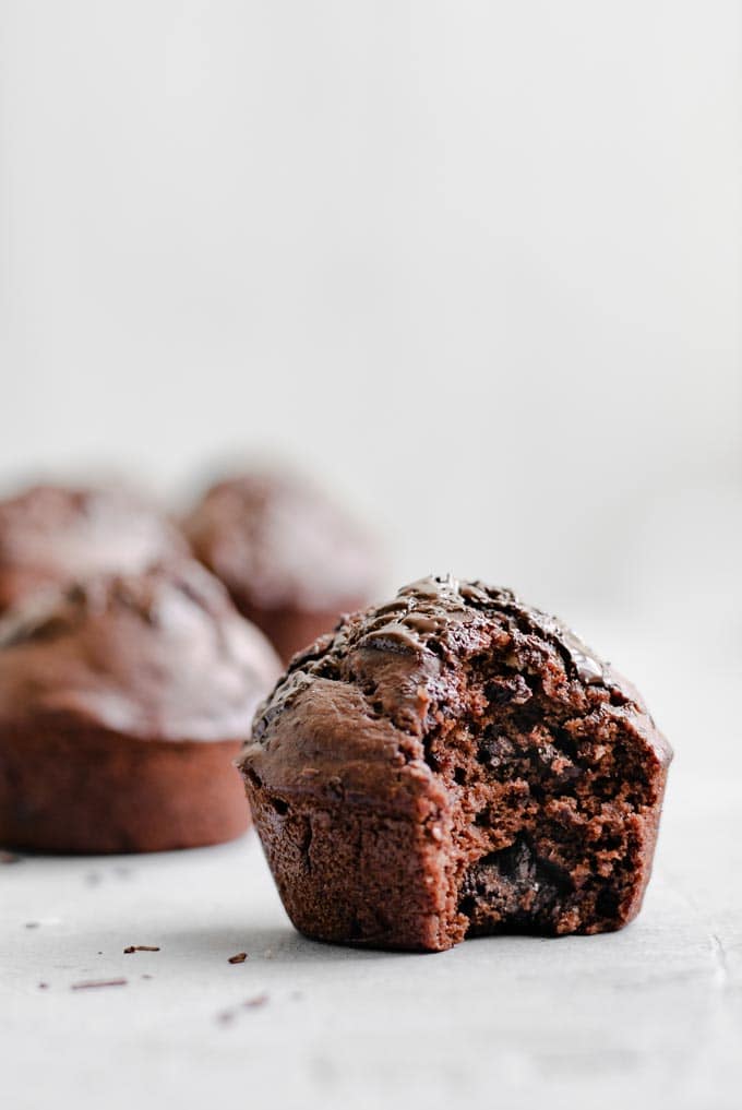 bite shot of a vegan double chocolate banana muffin