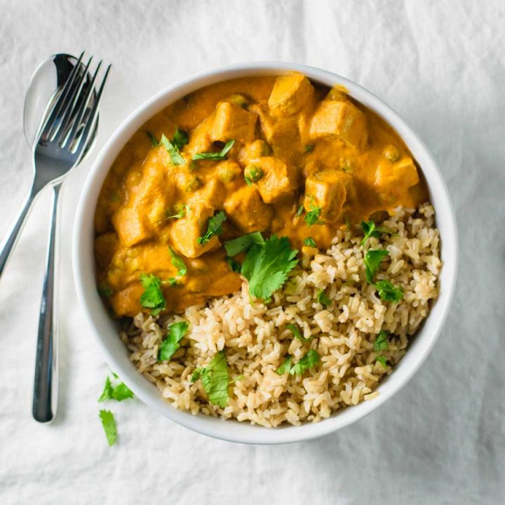 vegan mattar tofu paneer served with cilantro and lime