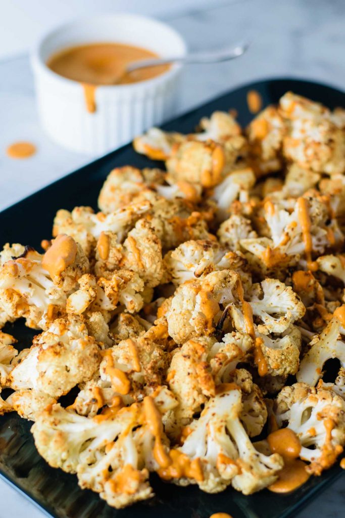 Mustard Roasted Cauliflower with Roasted Red Pepper Sauce • The Curious