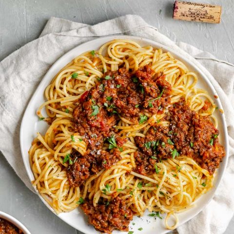 vegan black lentil bolognese with spaghetti and red wine