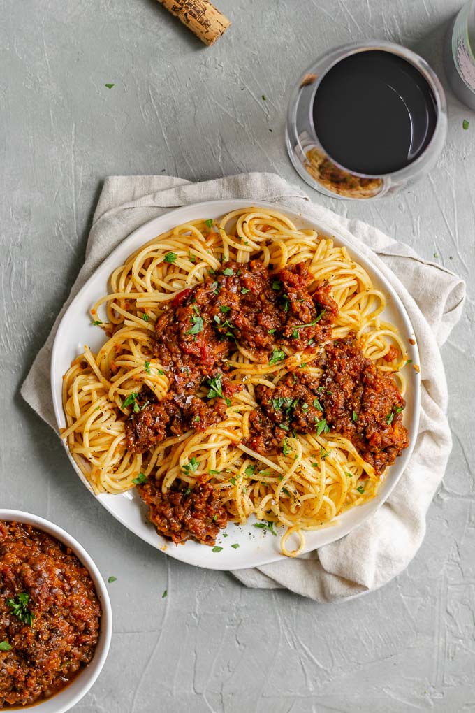 vegan black lentil bolognese with spaghetti and red wine