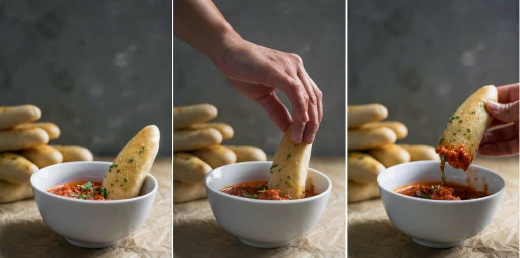 quick and easy homemade breadsticks with spicy marinara sauce for dipping