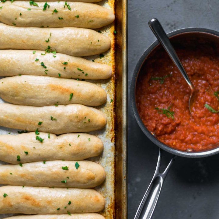 quick and easy homemade breadsticks with spicy marinara sauce for dipping