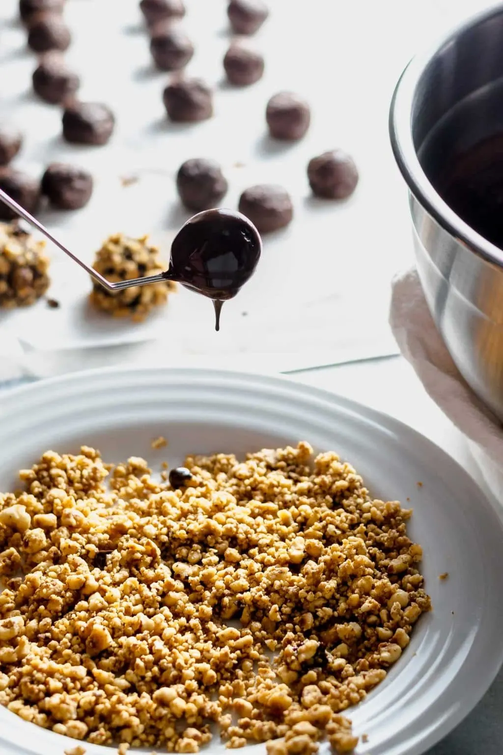 dipping vegan chocolate hazelnut truffles