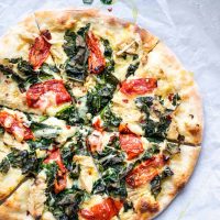 Crispy Kale, Roasted Tomato, and Vegan Chicken White Sauce Pizza