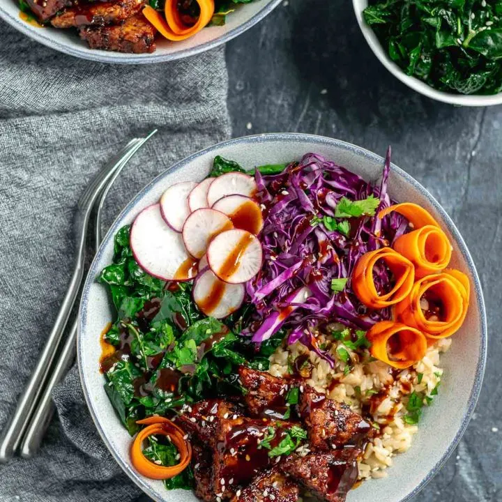 hoisin glazed tempeh bowls with sesame kale and hoisin sauce drizzle