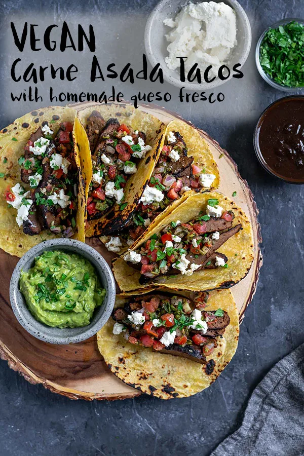 Vegan Seitan Carne Asada Tacos | Seitan is marinated in a spicy and tangy sauce then seared over a grill (or grill pan) until charred. The juicy seared seitan carne asada is thinly sliced then piled into warm corn tortillas and topped with pico de gallo, vegan queso fresco, and minced cilantro to serve. They are the most delicious vegan tacos! | thecuriouschickpea.com #vegan #seitan #Mexican #grilling