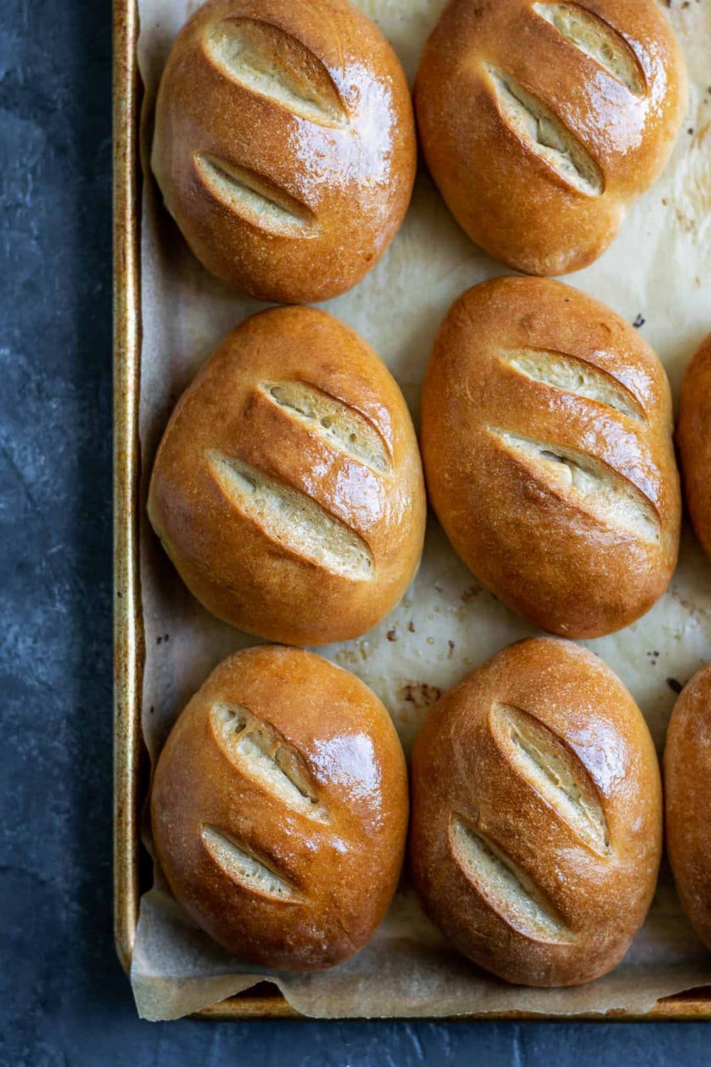 ultimate homemade sandwich rolls on baking sheet