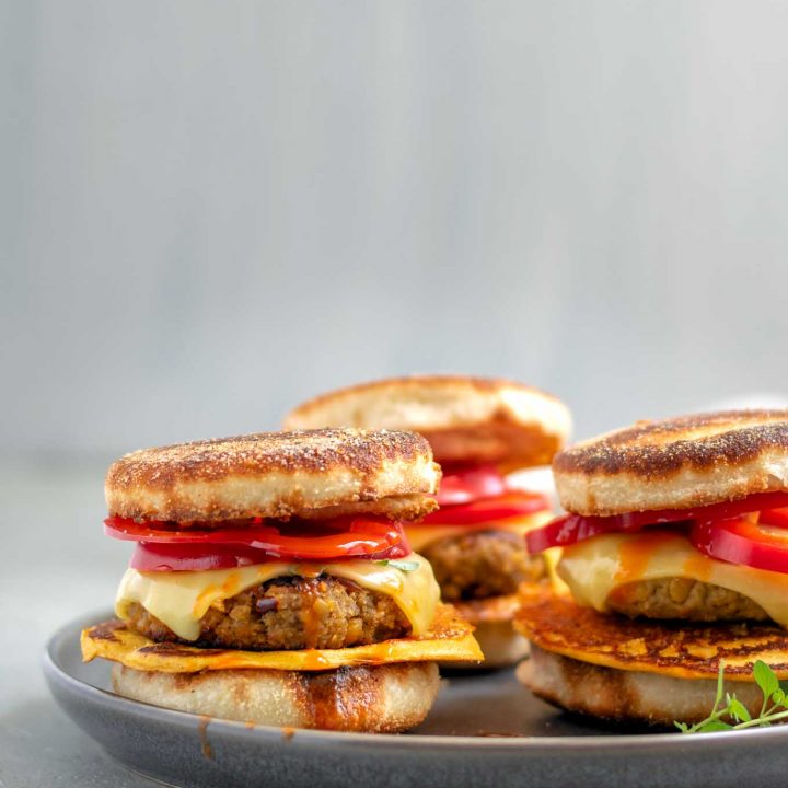 vegan breakfast egg and sausage muffins. 3 on a plate, side view