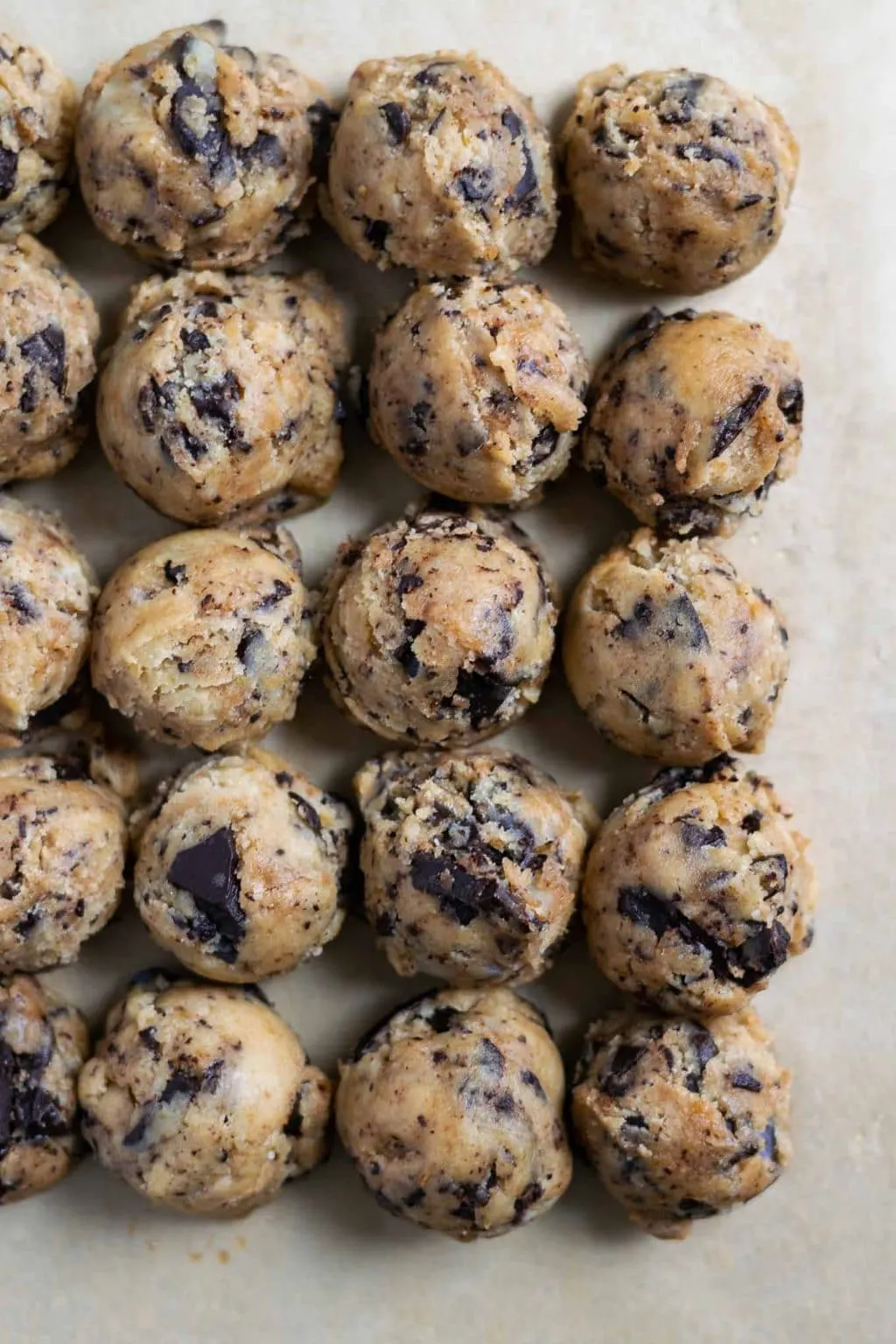 cookie dough balls of chewy vegan tahini chocolate chip cookies