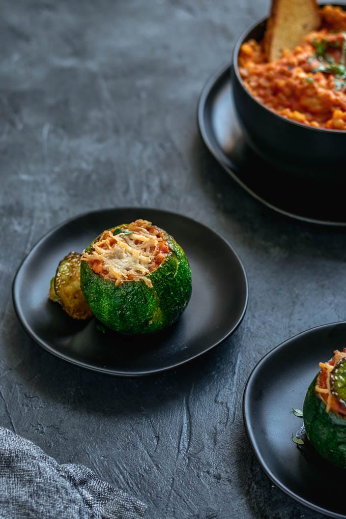 creamy vegan barley risotto stuffed zucchini