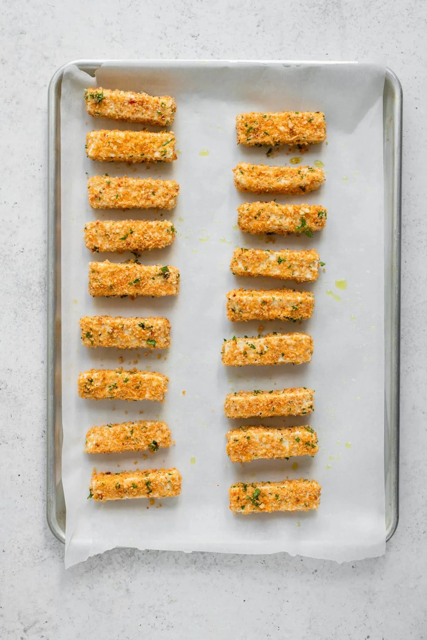 breaded tofu on baking tray before baking