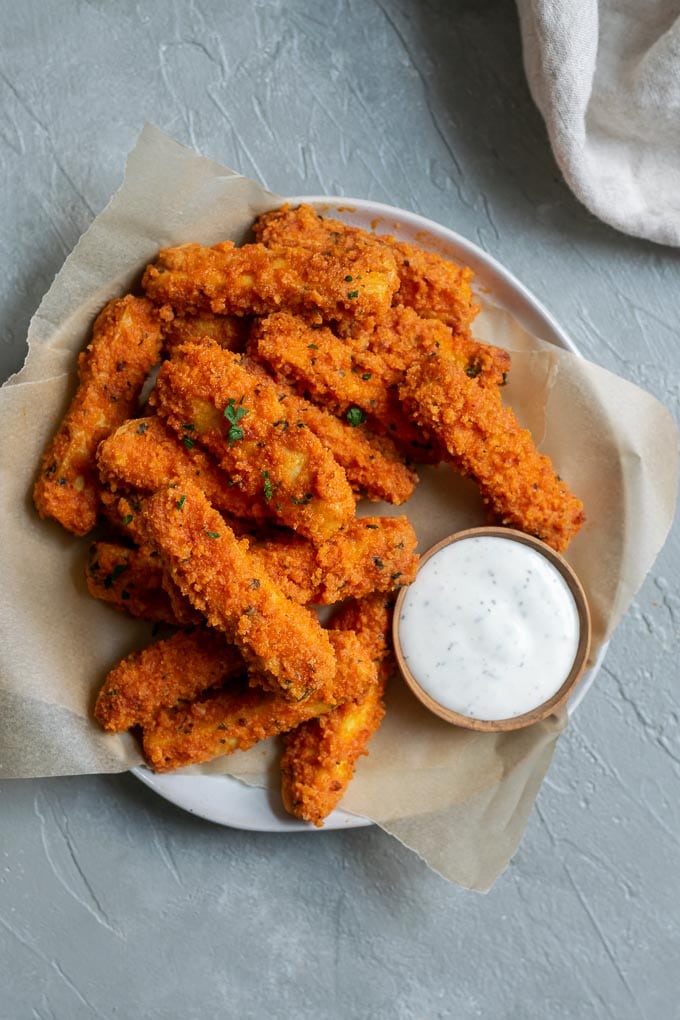 Crispy baked buffalo tofu wings with vegan bleu cheese dressing