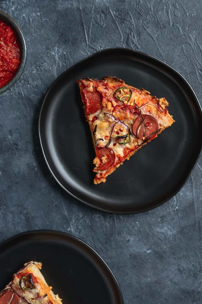 vegan pepperoni pan pizza served on plates
