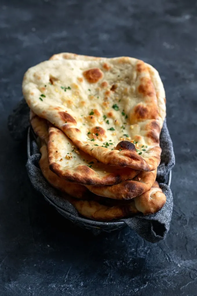 vegan homemade restaurant style naan, made into garlic naan