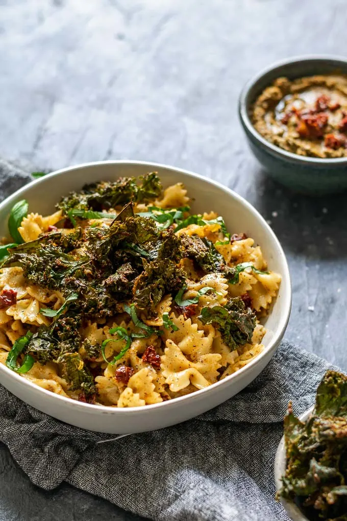 Sun dried tomato and kale pesto pasta with pesto crusted kale chips