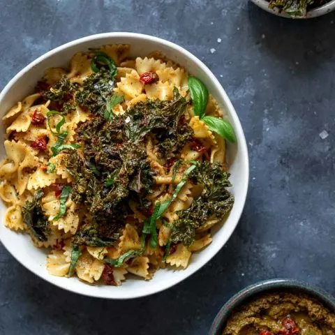 Sun dried tomato and kale pesto pasta with pesto crusted kale chips