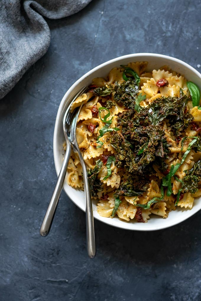 Sun dried tomato and kale pesto pasta with pesto crusted kale chips