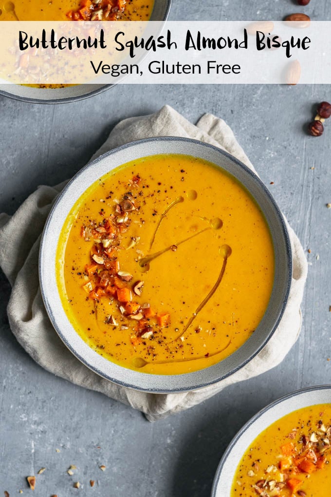 This mouth watering butternut squash almond bisque is perfect for fall. The butternut squash shines in this pumpkin-spice scented soup. This easy recipe is a perfect for you holiday menu! | thecuriouschickpea.com #vegan #thanksgiving #glutenfree #butternutsquash #soup