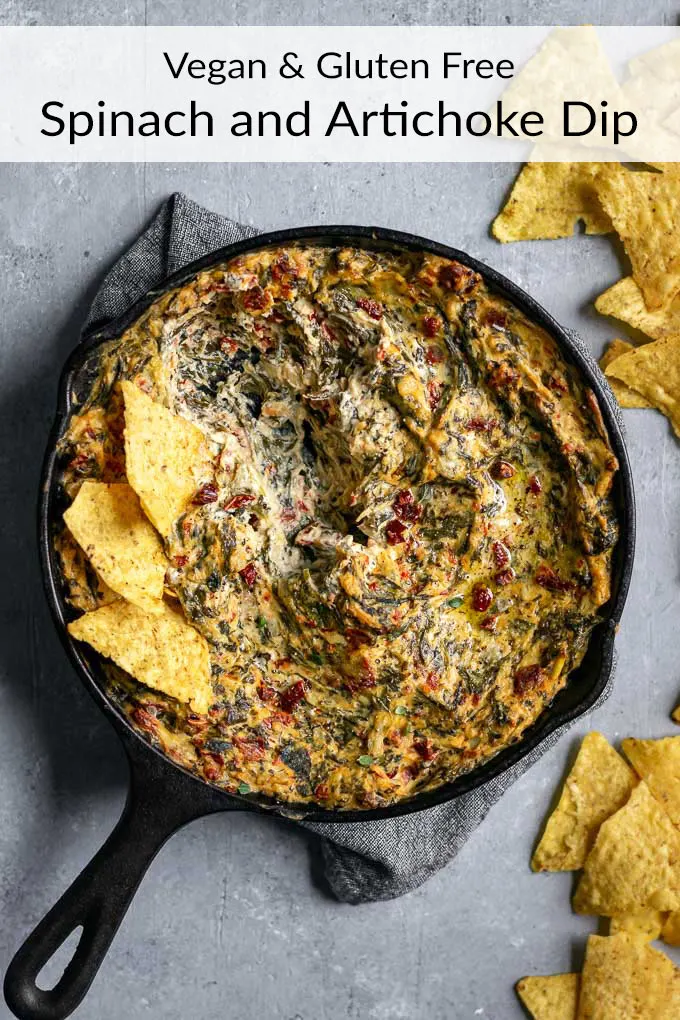 This delicious baked vegan artichoke spinach dip comes together in no time! It's easy to make, healthy-ish, super flavorful, and indulgent tasting. | thecuriouschickpea.com #vegan #glutenfree #spinachartichokedip