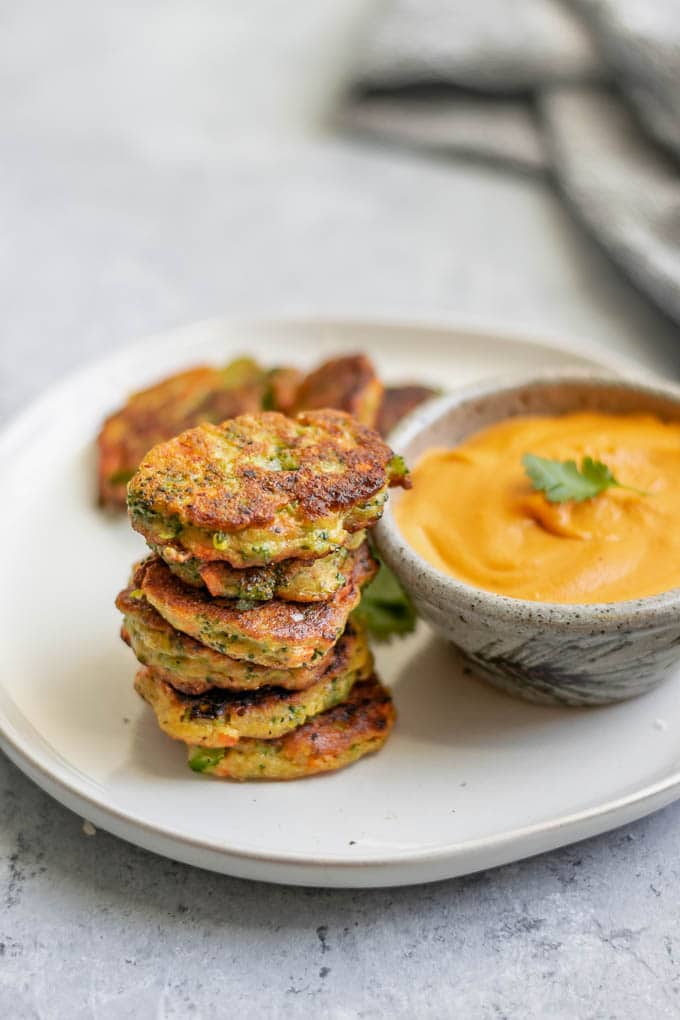 vegan broccoli fritters with smokey red pepper buffalo cheddar dip