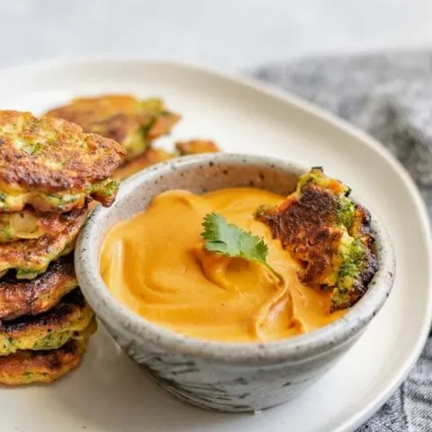 vegan broccoli fritters with smokey red pepper buffalo cheddar dip