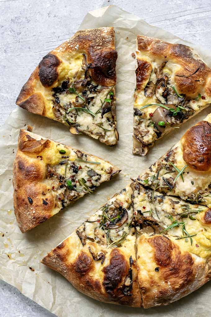 Vegan Caramelized Mushroom Pizza with a Garlic White Sauce, Caramelized Onions, and Fresh Rosemary