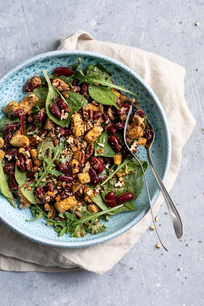 Miso-ginger tempeh with salad, pecans, and kidney beans, mustard dressing from the cookbook Vegan Reset by Kim-Julie Hansen