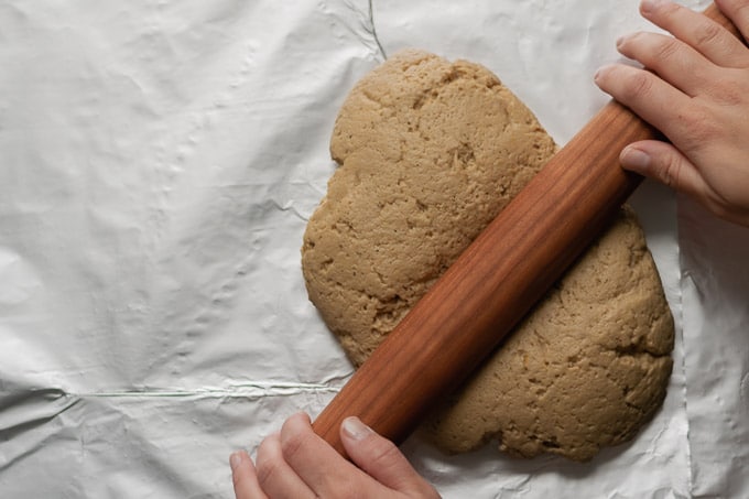 rolling out seitan dough for roast