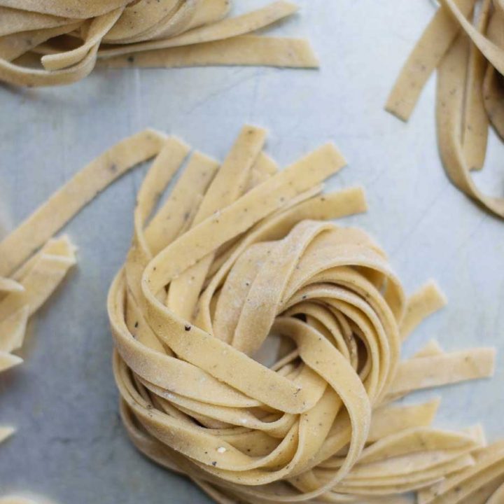 Easy homemade pasta made with vegan with aquafaba instead of eggs. The fresh pasta can be cut into thin spaghetti or wide noodles and it cooks up toothsome and delicious! | thecuriouschickpea.com #pasta #vegan #freshpasta #aquafaba