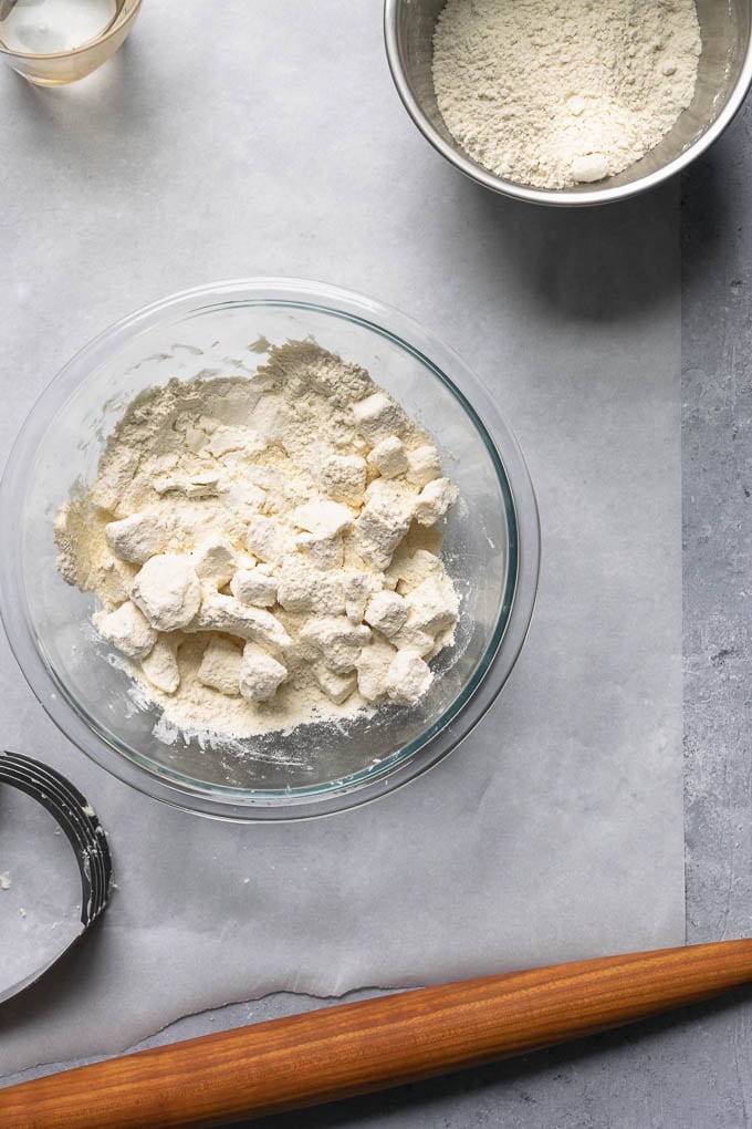 dry ingredients and vegan butter and shortening in bowl ready to be blended