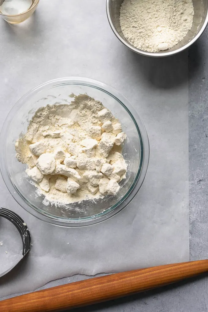 dry ingredients and vegan butter and shortening in bowl ready to be blended