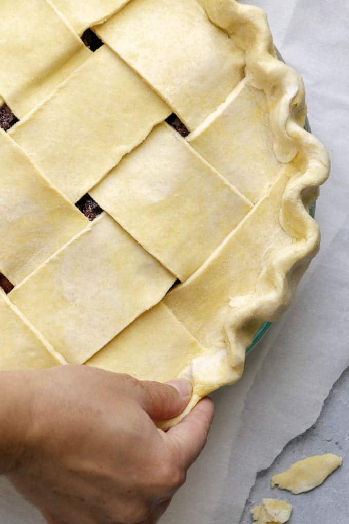 crimping the edges and pinching them into a ruffle