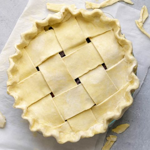 easy vegan pie dough, pre-baked pie double crusted with a lattice top