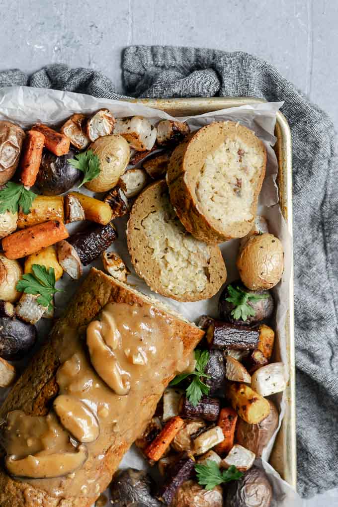 seitan roast stuffed with chestnut and white wine risotto topped with mushroom gravy and served with roasted vegetables